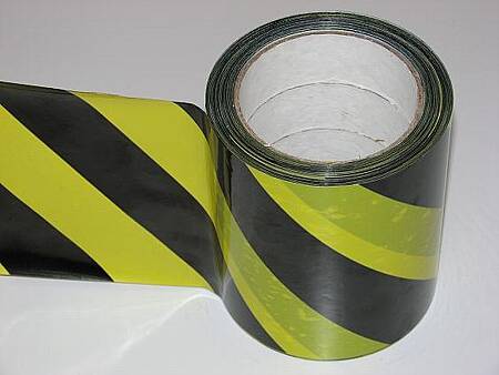 Páska G žlutočerná lepící, protisměrná 120mm